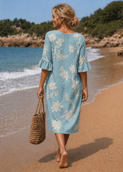 Calyra | Robe fluide estivale à boutons
